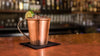 Hand hammered copper mug mexican mule on bar